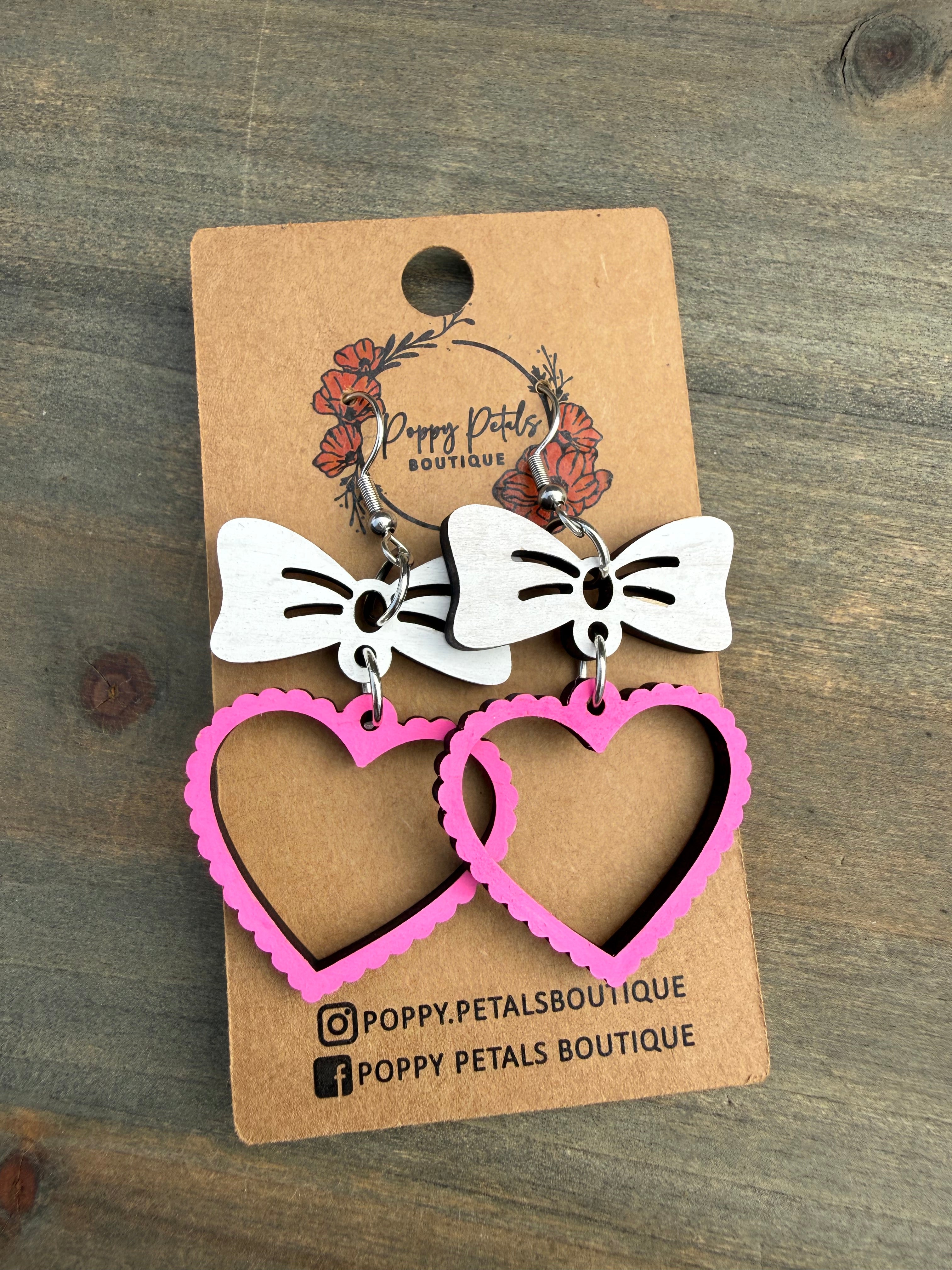 Bow with heart earring
